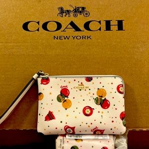 Authentic Coach, small zip pouch Holiday style!